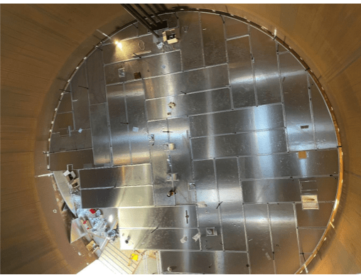Aluminium internal floating roof viewed from above inside a storage tank